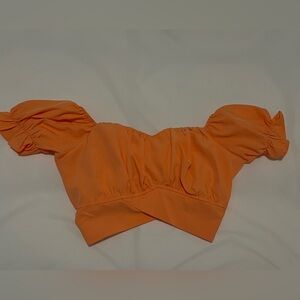 Women’s size M crop top. Off the shoulder, never worn.